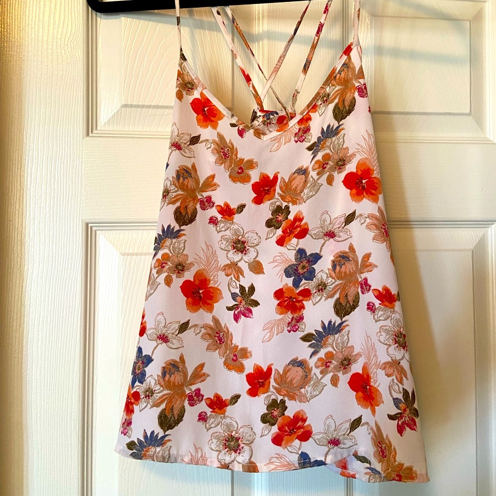 Hollister cross back tank top with floral print. Very lightly worn. Size small.